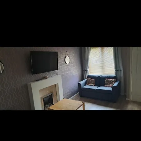 Family In A 2 Bed House